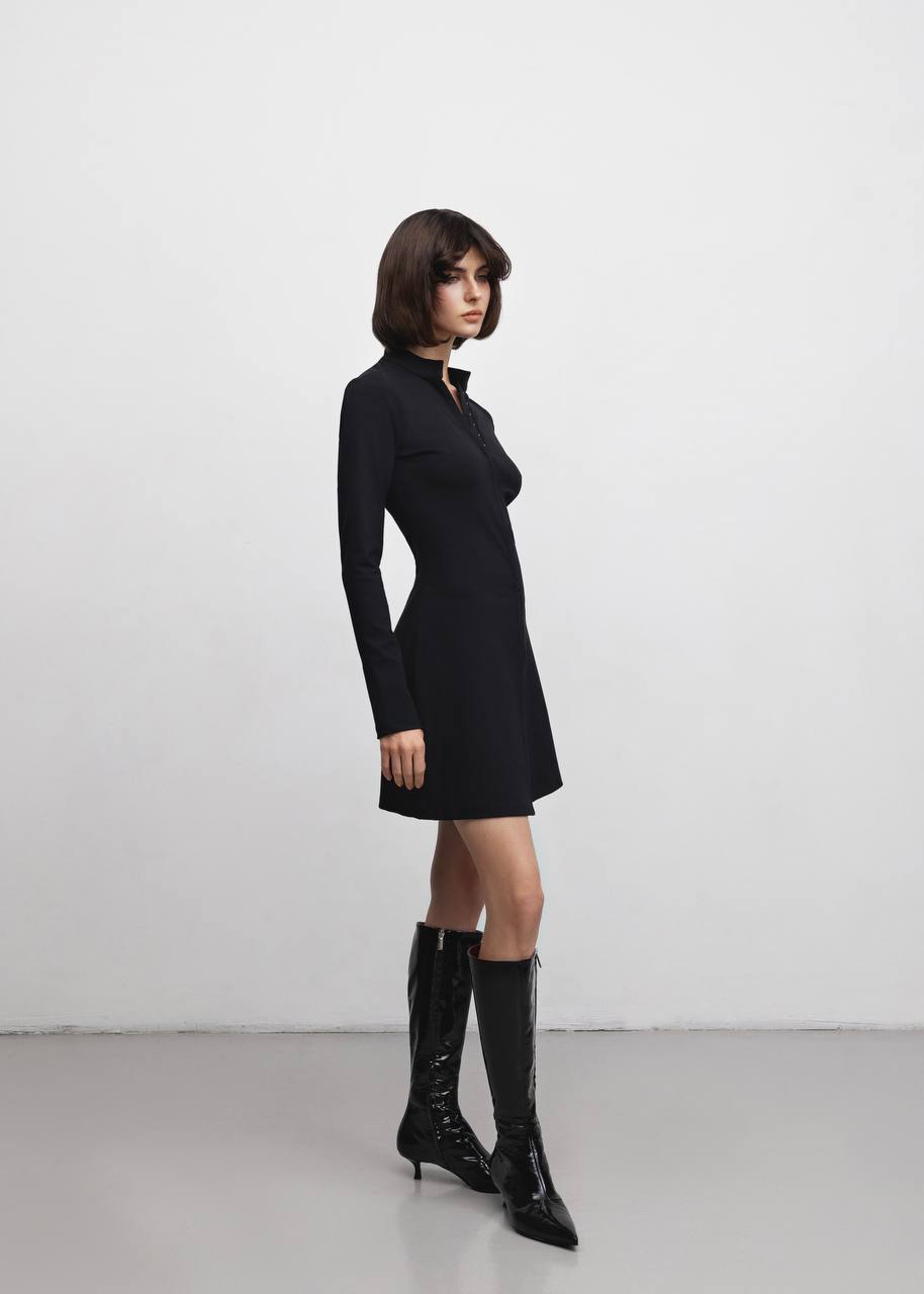Black mini dress with metal closures and structured collar